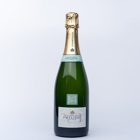 A 750ml bottle of Philizot et Fils Champagne Brut.