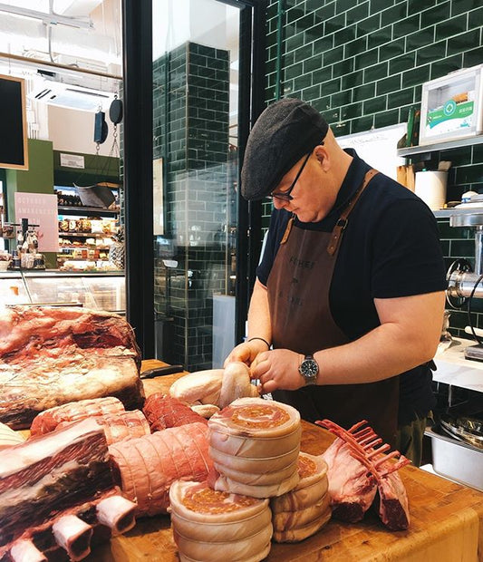Busy behind the butchers counter...