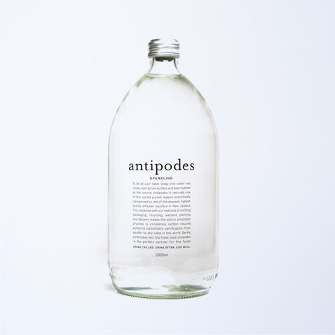 a 1l glass bottle of antipodes sparkling water.