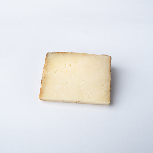 A 200g wedge of manchego cheese.