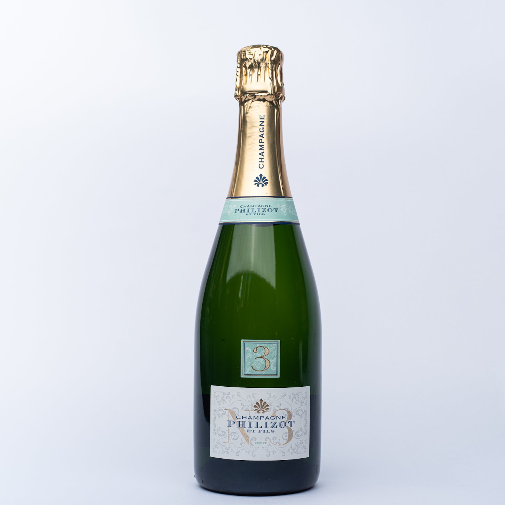 A 750ml bottle of 	 Philizot et Fils Champagne Brut.