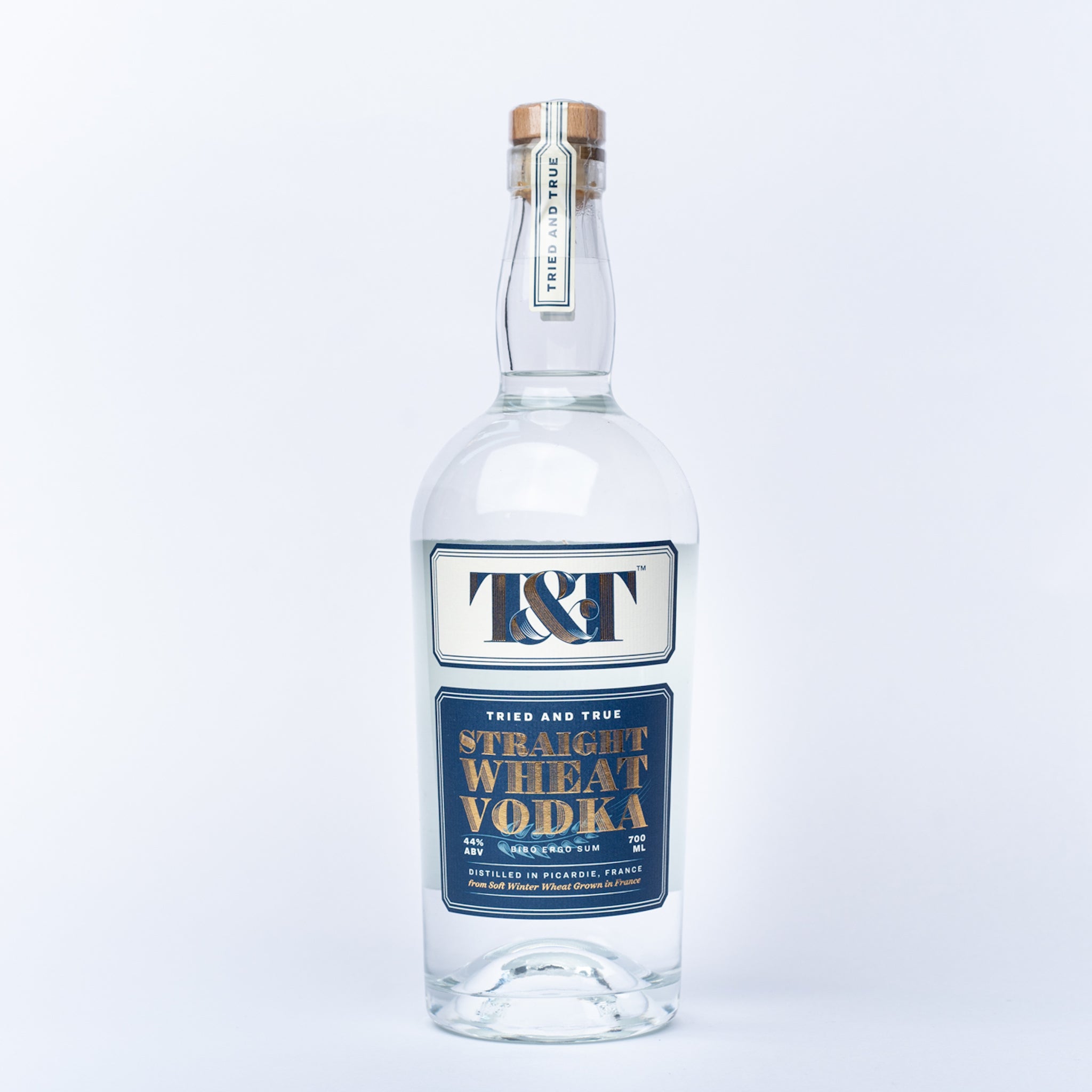 A glass bottle of Tried & True Straight Wheat Vodka.