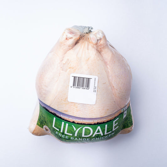 A 1.5kg lilydale chicken in a plastic bag with a green label.
