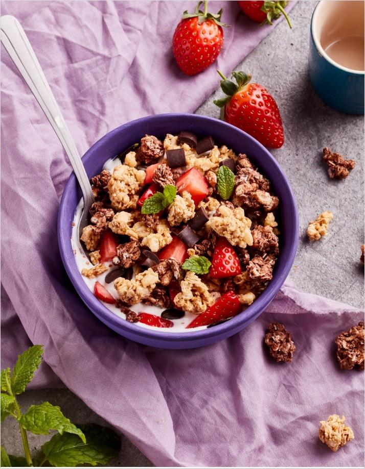 FUEL10K Chocolate Granola with berries in a bowl.