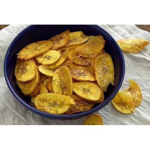 A black bowl of crunchy plantain chips.