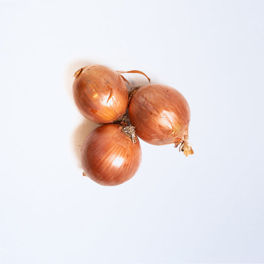 Three brown onions.